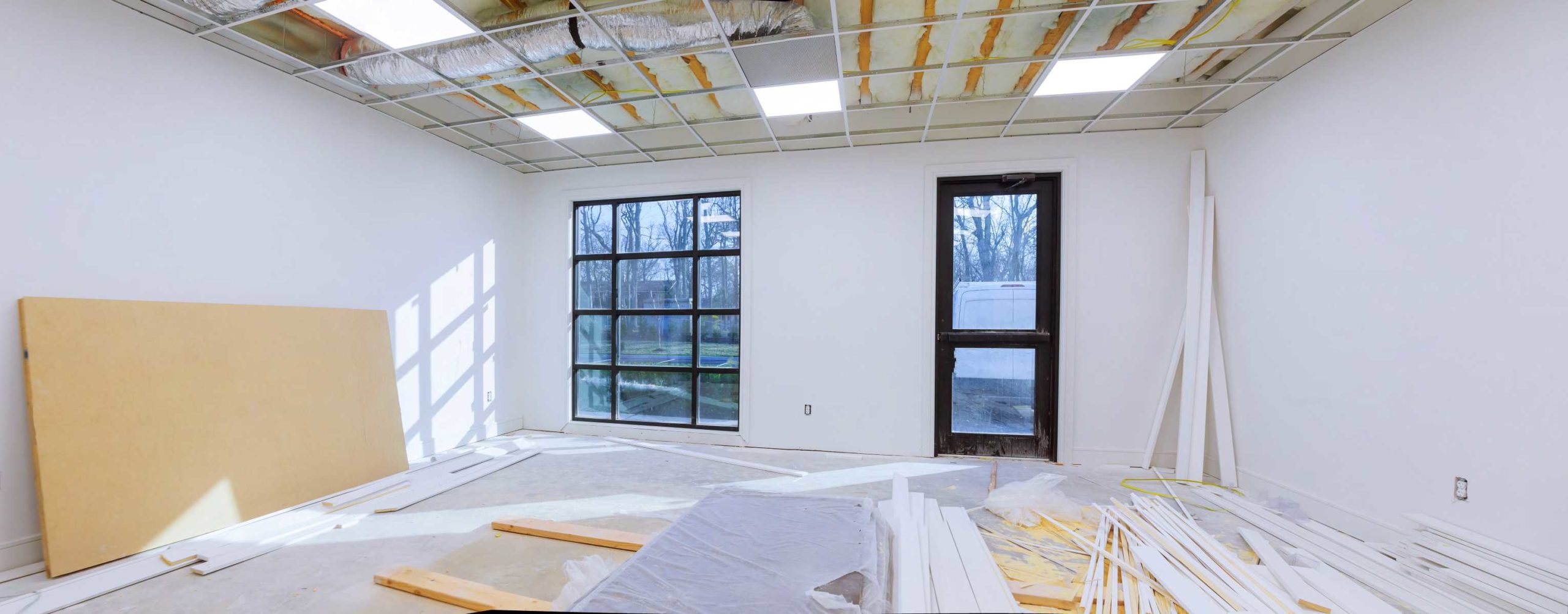 Acoustical Suspended Ceiling and Drywall